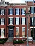 Original building demolished and replaced with historically accurate design in the 1960s, 722 Jackson Place[14]