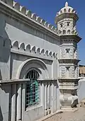 Exterior, with a squat minaret