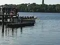 Traditional unloading of a departing commander with a marine cutter from the MUS dock