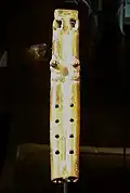 Aztec double flute uses an air duct to produce sound through the holes in the top of each pipe.