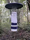 A carbon dioxide-baited CDC light trap at NPSmonitoring site: The highest individual light trap total for 2010 was from a trap located in a salt marsh in the Fire Island National Seashore: around 25,142 mosquitoes were collected during a 16-hour period on August 31.[81]
