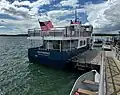 The Independence berthed at Stone Wharf on Chebeague Island in 2024