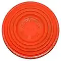 A 10 centimetres (4&nbsp;in) clay pigeon.
