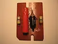 706 Regulator unit, the red part being a string of diodes and the glass part are the thermistors. The thermistor is painted black to stop the glow being shown