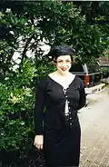Image 135Woman dressed in black maxi skirt, top and hat, 1995. (from 1990s in fashion)