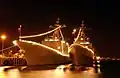 ROKS Munmu and ROKS Gwanggaeto the Great lighted ship's lights to celebrate the July 4th Independence Day 2006.