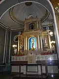 Retablo mayor with Nuestra Señora de Aguas Santas in the central niche