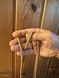 2 : ring finger end of the bight hooked by the thumb from outside and up