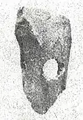 Perforated deer bone