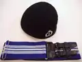 Midnight Blue beret, silver cap badge, (officers denoted by gilt cap badge), and stable belt. Badge depicts the Beacon Lighter within a laurel wreath, surmounted by a crown; the motto "FOREWARNED IS FOREARMED" on an overlying scroll.