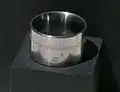 A two-scale slide rule built into a ring