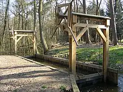 Model of early river pound lock, constructed in Lankheet water park, Netherlands.
