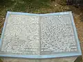 Panamalai temple stone carving explaining its history bilingually in English and Tamil