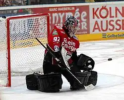 Thomas Greiss stopping a puck