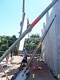 Panel being hoisted into position.