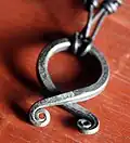 Erlands' troll cross as an amulet