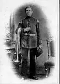 Young Herman Weiss with his tuba.